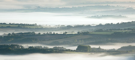 Pockets of early morning mist. Taken from Belstone